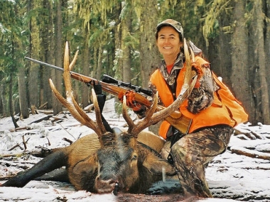 Successful hunter with a Cascade elk