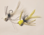 photo of two popper flies used to fish for bass