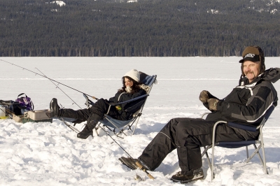 Two anglers ice fishing on Diamond Lake