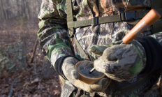 image of a hunter striking a slate with the striker