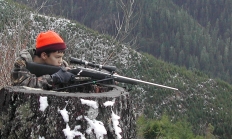 young hunter taking a shot