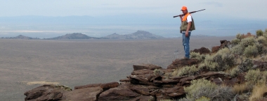image of chukar hunter scanning landscape in eastern Oregon