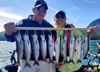 Two kokanee anglers with their catch