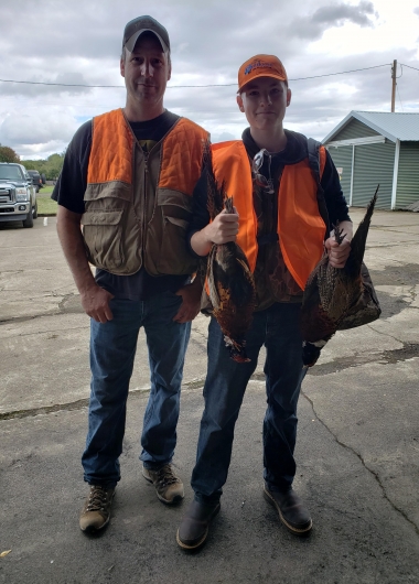 Youth pheasant hunter with adult mentor