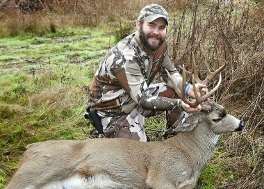 Hunter with a dandy black-tailed deer.