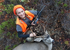 Young hunter poses with a nice buck deer