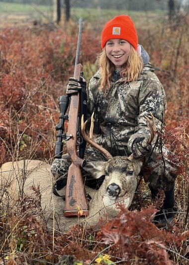 Dalilah Mathews with her blacktail deer after a Fall harvest extended youth hunt.