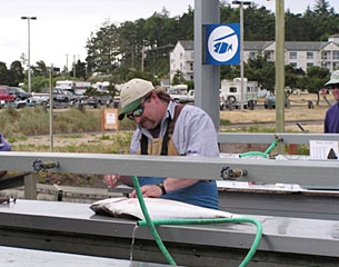 An angler cleaning his halibut