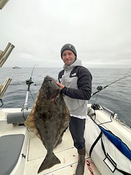An angler with his halibut.