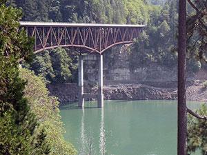 a bridge spans Lost Creek Reservoir