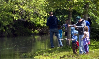 Family fishing at Alton Baker Canoe Canal