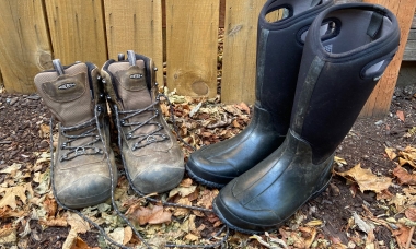 image of two kinds of boots -- leather hiking and waterproof rubber