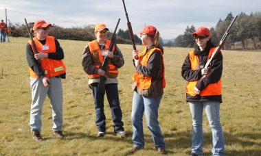 image of four shooters demonstrating good muzzle control