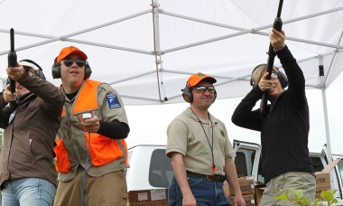 A pair of shotgun shooters getting instruction