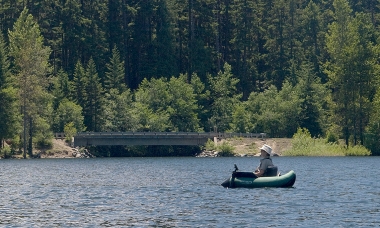 Float tube angler fishing on Laurance Lake