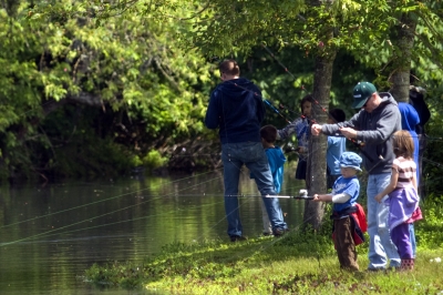 Family fishing at Alton Baker Canoe Canal