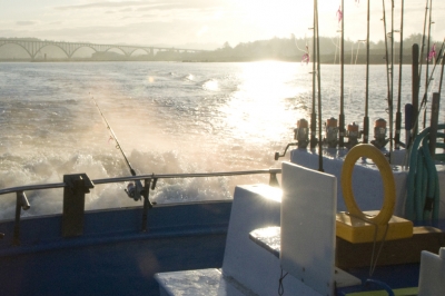 image of an ocean charter boat leaving Newport