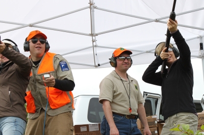 A pair of shotgun shooters getting instruction