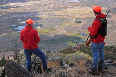 Two big game hunters on a ridge