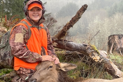 Young hunter with her first cow wlk