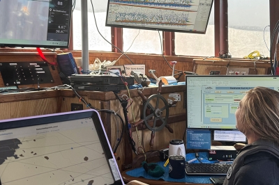 082925_Alex_Copeland_monitors_scientific_fish_finders_on_board_the_research_vessel_2025.jpg